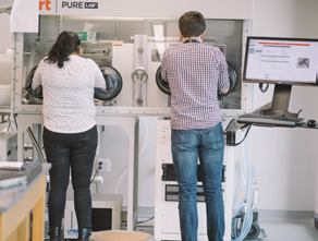 Students working at laboratory equipment